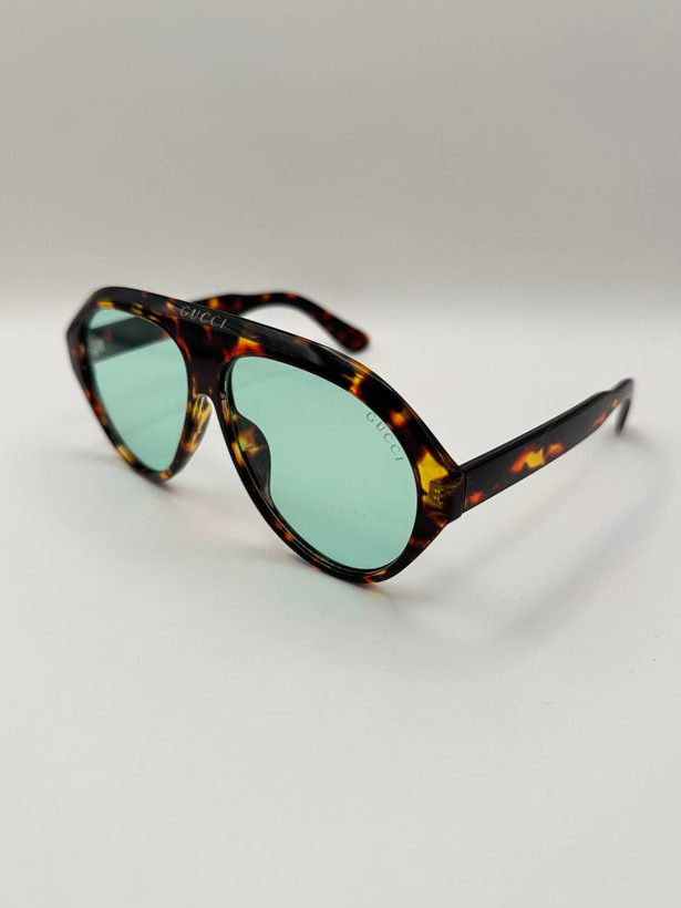 عینک خلبانی اسپرت GUCCI بدنه کائوچو یووی ۴۰۰ عدسی پلی کربنات . کد۳۶۰۷