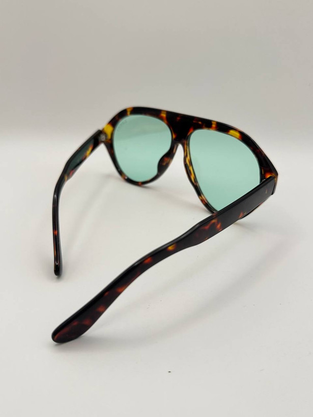 عینک خلبانی اسپرت GUCCI بدنه کائوچو یووی ۴۰۰ عدسی پلی کربنات . کد۳۶۰۷