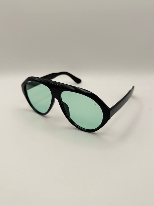 عینک خلبانی اسپرت GUCCI بدنه کائوچو یووی ۴۰۰ عدسی پلی کربنات . کد۳۶۰۷