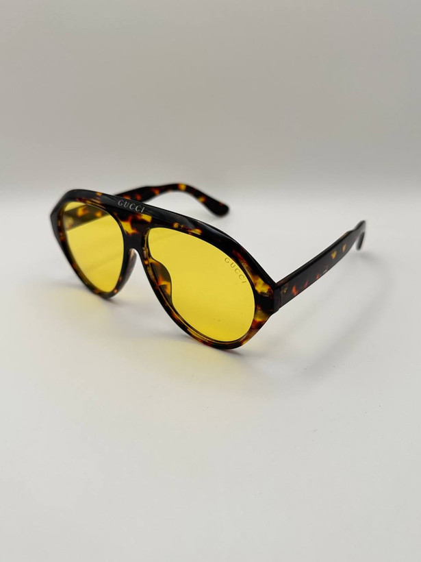 عینک خلبانی اسپرت GUCCI بدنه کائوچو یووی ۴۰۰ عدسی پلی کربنات . کد۳۶۰۷
